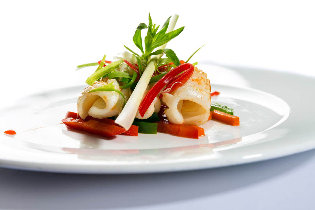 14.	Savor gourmet dining while anchored among Halong Bay’s islands